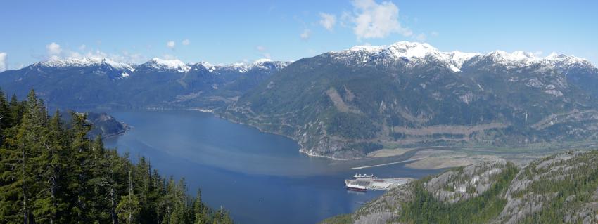 Aerial view of harbour in Squamish with mountains in the background