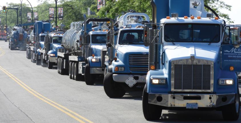 McRae's trucks lined up along a road