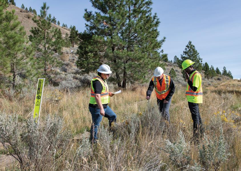 Matt Mason, Dr. Lauchlan Fraser and Dr. Moro Fajiye visit FortisBC’s gas line right of way in Kenna Cartwright Park.