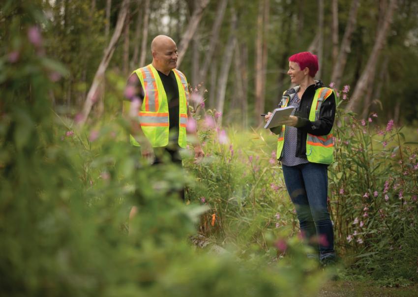 Greg Edgelow and Caroline Astley talk in Burnaby Lake park