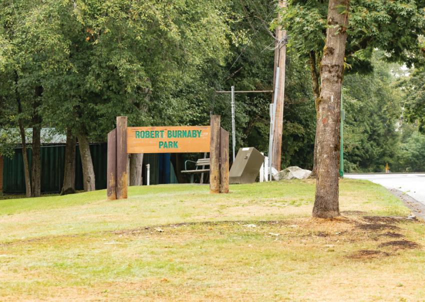 Robert Burnaby Park wooden sign at park entrance