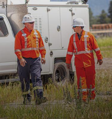 Two workers in safety gear